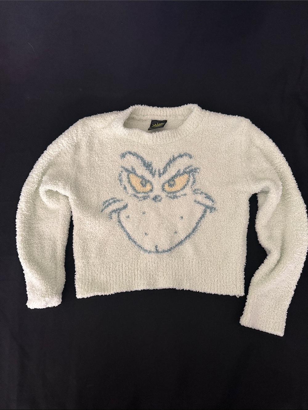 Cozy Cream Grinch Face Fuzzy Sweater - Girls